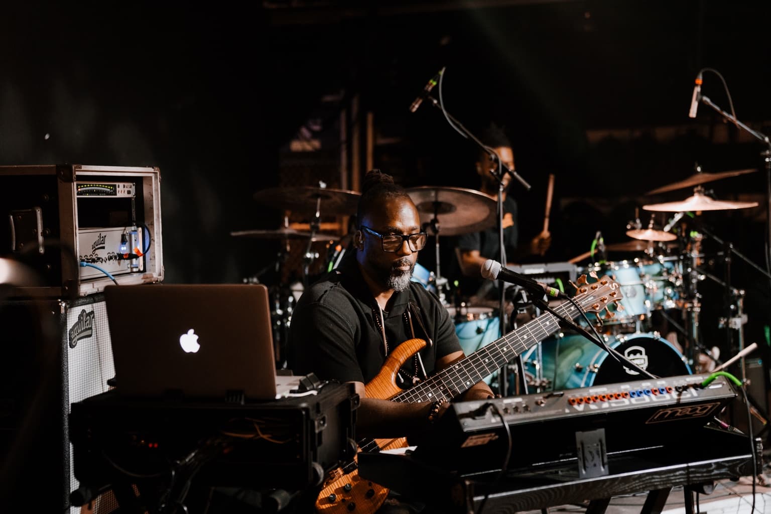 Jermaine Williams playing bass on stage